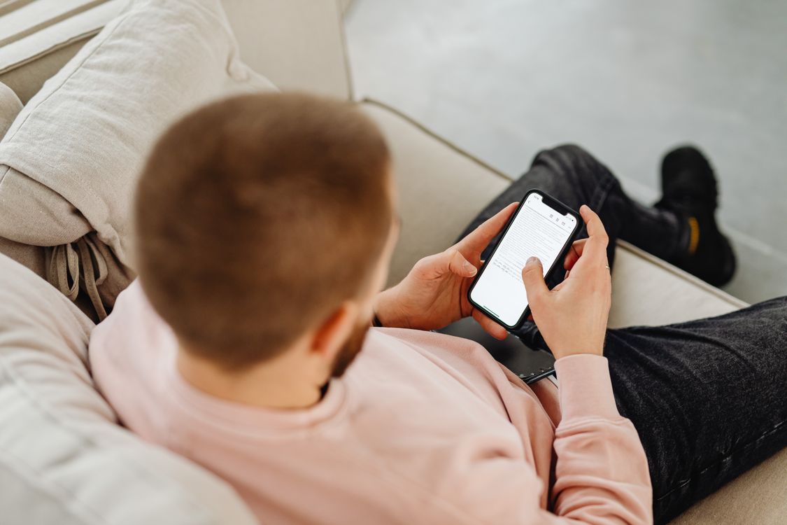 Someone using a phone at home